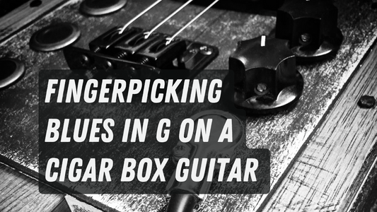 Fingerpicking Blues in G on a cigar box guitar